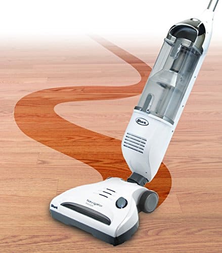 image shows the shark navigator stick vacuum demonstrating the swivel head that provides easy maneuvering